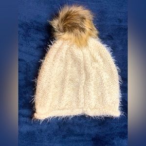 White beanie with puff